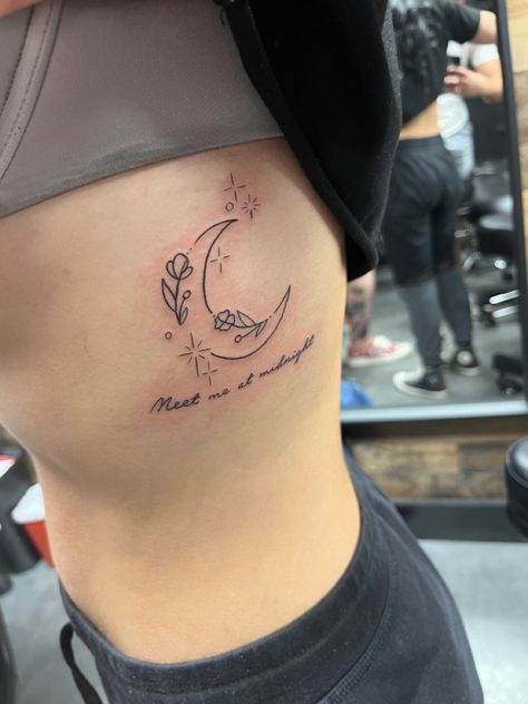 taylor swift lyrics moon tattoo flowers Its Time To Go Taylor Swift Tattoo, Meet Me At Midnight Tattoo, Taylor Swift Afterglow Tattoo, Midnight Tattoo Taylor Swift, Taylor Swift Tattoo Symbol, Taylor Swift Haunted Tattoo, Taylor Swift Tattoos Midnights, Taylor Swift Wonderland Tattoo, Moon Tattoo With Quote