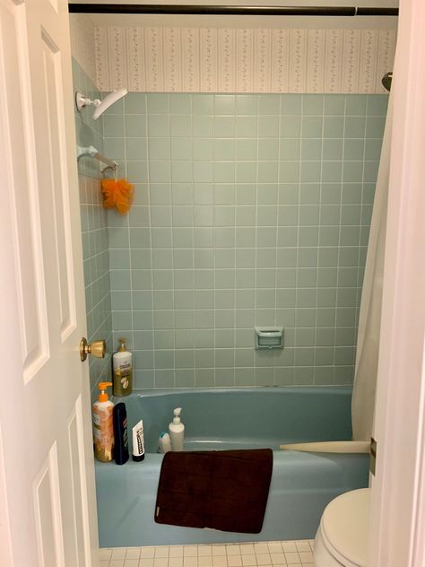 Blue Tile Retro Bathroom, Over Shower Bath, 1970s Blue Tile Bathroom, Updating Vintage Tile Bathrooms, Blue Bathroom Suite Retro, Colored Bathtub Ideas, Bathroom Interior Design Vintage, Two Tone Tiles Bathroom, Bathroom Shower Tile Ideas Vintage