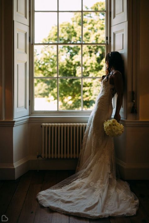 A beautiful bride semi-sillhouetted with a stunning bouquet photographed at her wedding at Botleys Mansion. Wedding Photography - Bride, Poses, Ideas, Surrey, UK Botleys Mansion, Bridal Pose, Wedding Planning Apps, Mansion Wedding Venues, Wedding Photography Bride, Bridal Poses, Mansion Wedding, Stunning Gowns, Bride Poses