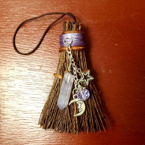 Beautiful Miniature Witch's Broom, Strongly Fragranced With Your Choice Of Scents. Sized Just Right For Your Home, Car, Altar Or Kitchen. Hand Twined With Metallic Purple Thread And Ornamented With Purple Crystal Quartz, Silver Star Charm, Purple Crystal Bauble, And A Silver Moon. Includes Elastic Cord To Hang From A Door, Mirror, Handle Or Tree. Packaged In A Purple Organza Bag, Perfect For Gift Giving. Broom Size: 3.5" L X 2.5" W We Do Custom Orders On Colors And Charms! Just Send Us A Message Witchy Gift Basket, Basic Witch Supplies, Crystal Broom, Witch Crafts Diy, Diy Mini Witch Broom, Diy Broom, Pagan Protection, Crystal Wire Broom, Witch Items