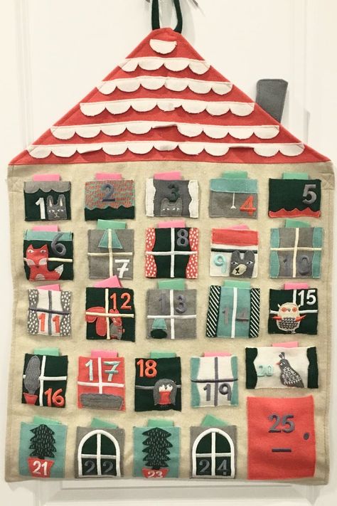 I Got a Reusable Advent Calendar, and Here's Why I'll Never Buy a Pre-Loaded One Ever Again Advent Calendar For Kids, Reusable Advent Calendar, Advent Diy, Felt Advent Calendar, Calendar For Kids, Fabric Advent Calendar, Chocolate Advent Calendar, Christmas Advent Calendar Diy, Handprint Ornaments