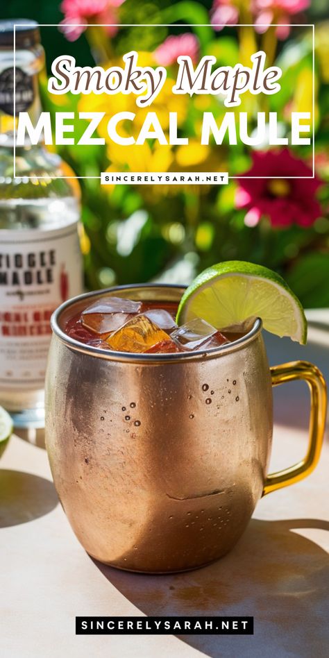 Meet your new favorite cocktail – the Smoky Maple Mezcal Mule! 🍁 This drink is a delightful fusion of smoky, sweet, and spicy, making it a standout choice for any occasion. The combination of mezcal, maple syrup, and ginger beer creates a flavor profile that's both bold and balanced. Try the Smoky Maple Mezcal Mule at your next gathering and watch it become a hit! 🍸 Mule Drink Recipes, Fall Cocktails Easy, Cranberry Sangria, Cocktail Cupcakes, Mezcal Margarita, Ginger Beer Cocktail, Banana Chocolate Chip Cookies, Mezcal Cocktails, Pineapple Cocktail