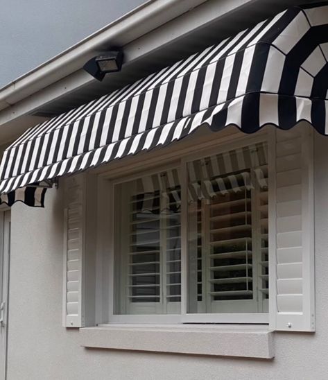 Check it out! 😱 @maryellenmelbgirl decked out her home with @collingwood_fc inspired Canopy Awnings & we love it! 😍👏🏼 Not only are these awnings brilliant at increasing shade & privacy in her home, but the classic black & white stripes are the ultimate tribute! 🙌🏼 #wynstanwithay #canopyawnings #ultimatehomereno #homeimprovements #awnings #homeenvy #stunninghomes #melbourneproperties #melbournehomes Black White Awning, Black And White Awning, Concealed Doors, Awning Ideas, Front Door Awning, Canvas Awnings, Window Canopy, Two Story House Design, Outdoor Window