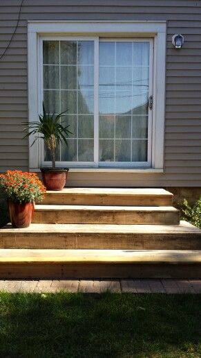 Wide patio steps - perfect for hanging out Deck Stairs Down To Patio, Steps To Patio From House, Wide Patio Steps, Steps From Back Door To Patio, Patio Door Steps Ideas, Stairs Down To Patio, Back Door Steps To Patio, Step Down Patio, Patio Steps From House