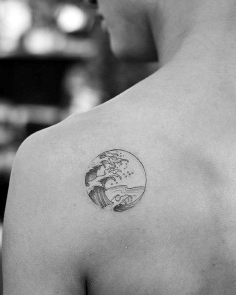 Circle Simple Wave Tattoo On Mans Shoulder Water Tattoo Ideas Simple, Wave Tattoo Circle, Shoulder Circle Tattoo, Water Tattoo Ideas, Tattoos On Shoulder, Water Tattoos, Cool Simple Tattoos, Tattoos For Women On Thigh, Heart Outline Tattoo