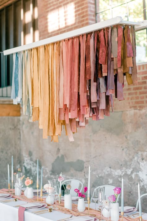 Wedding Reception | Learn about the creative process behind the muted rainbow ribbon chandelier that adorns this chic industrial micro wedding celebration. Ribbon Chandelier, Muted Rainbow, Rainbow Ribbon, Micro Wedding, Wedding Los Angeles, The Ceiling, Decoration Table, Wedding Trends, The Table