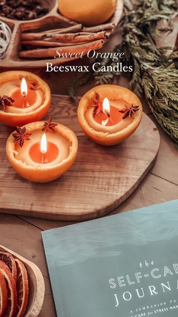 Daniella Esposito on Instagram: "Our favourite orange beeswax candles that went viral last year. 🍊 We love making these during the cozy season. NOTE: You can simply create using beeswax if you don’t feel comfortable with essential oils. Additionally, be sure to use within 3-5 days. If kept too long, the peel will create mold. Compost after using. Ingredients: 🍊100% Pure beeswax 🍊Essential oils (OPTIONAL) 🍊100% cotton wick 🍊Natural sweet oranges 🍊Cloves Directions: Melt your beeswax using a double boiler on med/low heat. Cut oranges in half. Clean out inside of oranges (we saved the insides for smoothies). Prep your wicks and place onto oranges. Now that oranges are prepped, your may OPTIONALLY add your essential oils to the melted beeswax and stir (depending on how much wax you use, Christmas Beeswax Candles, Intentional Gifts, Diy Cleaner, Aesthetic Lighting, Beeswax Candles Diy, Herbal Candles, Candles Burning, Christmas Candles Diy, Homestead Kitchen