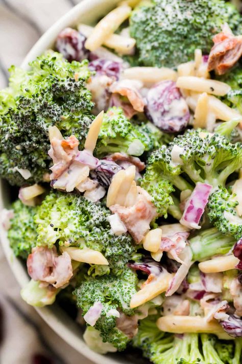 This classic Broccoli Crunch Salad recipe is an easy side dish that comes together in less than 15 minutes. It's made with crunchy broccoli, bacon, dried cranberries, almonds and a creamy homemade dressing. Brocoli Salad Recipes, Broccoli Salad Dressing, Crunchy Salad Recipes, Brócoli Salad, Broccoli Crunch Salad, Raw Broccoli Salad, Crunchy Broccoli, Broccoli Bacon, Crunch Salad