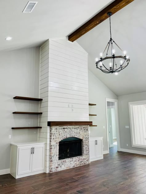 Fake Farmhouse Fireplace, Gas Fireplace Ideas Cathedral Ceiling, Long Hearth Fireplace, Built Ins Around Fireplace Vaulted Ceiling, Fireplace With Slanted Vaulted Ceiling, Shiplap Tall Fireplace, Living Room Fireplace Ideas Farmhouse, Modern Country Lighting, Brick Fireplace Cathedral Ceiling