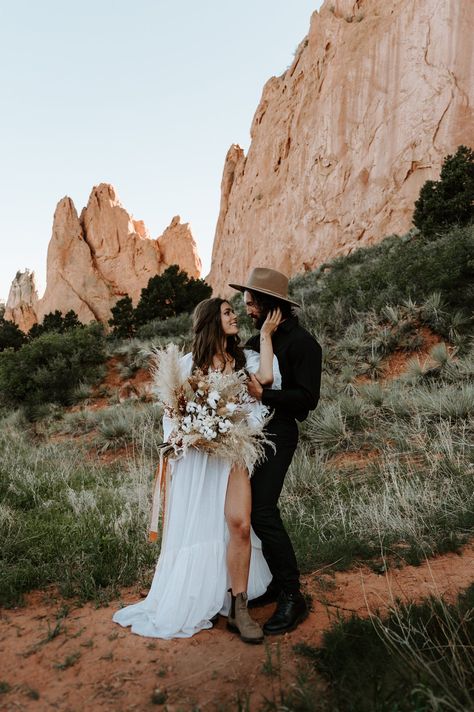 If you've been considering eloping in Colorado, 2023 might be the perfect year for you! Here's why: the state is full of natural beauty, from the Rocky Mountains to the desert landscapes. And, with so many elopement locations to choose from, you're sure to find the perfect spot for your intimate ceremony. Plus, with a Colorado elopement photographer, you can capture the magic of your day and create lasting memories. Elopement With Friends, Colorado Mountain Elopement Photos, Elopement In Colorado, Colorado Springs Elopement, Colorado Elopement Photography, Mountain Elopement Dress, Elope Colorado, Elopement Poses, Best Place To Elope