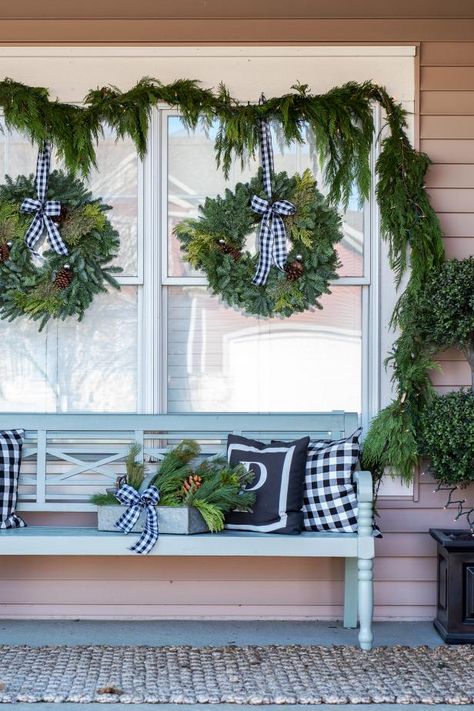 HGTV's Christmas craft pros share tips for hanging holiday wreaths on your windows without damaging the window's frame or glass. Wreath Exterior Windows, Christmas Wreaths Windows Outdoor, Exterior Christmas Wreaths On Windows, How To Hang Wreaths On Windows Outdoor, Window Wreath Outdoor, Hanging Wreaths On Windows With Ribbon, Wreaths For Windows Outside, Old Window With Wreath, Wreaths On Windows Outdoor