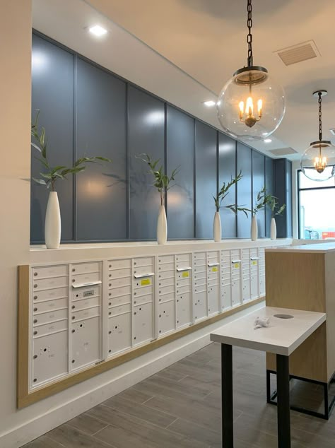 Long Narrow Retail Space, Mailroom Interior Design, Multifamily Interior Design, Apartment Mail Room, Mail Room Design, Mailroom Design, Small Apartment Complex, Community Space Design, Apartment Mailboxes