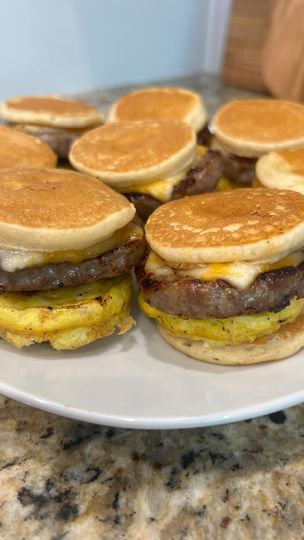 22M views · 1.4M reactions | These Mini Sausage McGriddles are life!!! It’s a must you give them a try and let me know what you think! It’s a must save, and try! Make sure to follow me @zeenbyreem for more ideas! All you need : 6 eggs salt and pepper 24 frozen mini pancakes @eggo_us Syrup @simpletruth4u 12 mini breakfast sausage patties 3 slices of cheese, Any kind you prefer Directions : 1. Preheat oven to 350 2. Grease up the muffin pan 3. Crack six eggs, and beat with salt and pepper 4. Pour egg mixture into the muffin pan and cook in the oven for 10mins 5. While the eggs are in the oven, Grab a large skillet spray with Pam or oil cook sausage patties until browned 6. Grab a different muffin pan or same one and coat it with butter or nonstick spray, and start layering 7. Sta Mini Pancake Meal Prep, Mini Pancake Sausage Bites, Mini Sausage Mcgriddles, Sausage Mcgriddle Recipe, Mini Mcgriddles, Mini Mcgriddle Bites, Frozen Mini Pancakes, Mcgriddle Bites, Pancake Cups