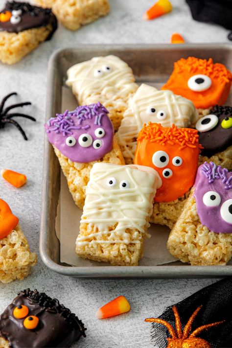 These spooky Halloween Rice Krispie Treats are hair-raising fun! When these mummies and monsters arrive at the party, all the Halloween ghosts and ghouls will show up to snag one. I highly recommend that you make 2 batches. Save this easy Halloween Rice Krispie Treats recipe for later. 📌 Pin it now! Rice Krispie Treats Ghosts, Halloween Desserts Rice Crispy Treats, Ricecrispytreats Halloween, Ghost Rice Krispie Treats, Rice Krispies Treats Ideas, Rice Krispie Treats Halloween, Monster Rice Krispie Treats, Halloween Rice Crispy Treats, Rizz Party