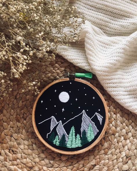 "Starlit"....🌕✨ How does it make you feel? I'd love to hear your thoughts! Share your favorite outdoor memory or tag a friend who would love to experience this kind of serenity.. 💫 #handembroidery #mountainview #starrynight #natureart #peacefulmoments #handcraftedwithlove #embroideryart #natureinspired #artwithheart Hand Embroidery Art,bNature-Inspired Embroidery, Mountain Scene Embroidery, Starry Night Art, Handmade Wall Decor, Embroidered Hoop Art, Custom Embroidery Design, Home Decor ... Mountain Hand Embroidery, Camping Embroidery Designs, Embroidered Mountains, Scene Embroidery, Mountain Embroidery, Landscape Embroidery, Starry Night Art, Embroidered Hoop, Handmade Wall Decor