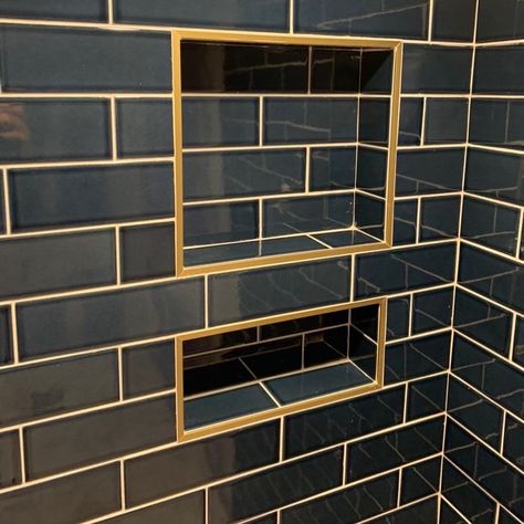 Schluter-Systems North America on Instagram: “Cool contrast to frame this niche! Here’s a Jolly profile in satin brass for an added touch of that brass, class.  Thanks…” Tile Shower Niche, Bathroom Niche, Bathtub Surround, Woodland House, Rectangle Tiles, Outdoor Baby Shower, Tile Edge, Shower Floor Tile, Kitchen And Bath Remodeling