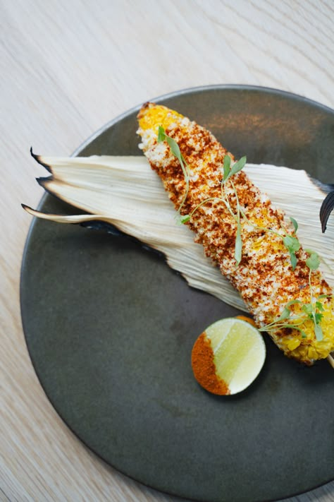 Mexican street corn with spicy chipotle mayo, panela, chile and lime. Enjoy lunch time dining at Rosewood Baha Mar in The Bahamas. Fresh, vibrant and flavorful. Mexican Food Plating Ideas, Mexican Fine Dining Recipes, Elevated Mexican Food, High End Mexican Food, Mexican Gourmet Food, Mexican Food Plating, Mexican Fine Dining, Mexican Restaurant Food, Rosewood Baha Mar