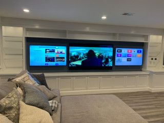 Multiple TV Wall - Farmhouse - Basement - DC Metro - by Custom Works AV Inc | Houzz Gaming Room 2 Tvs, Multiple Tv Wall Design, Basement With Multiple Tvs, Multiple Tvs In Basement, Double Tv Game Room, Basement Multiple Tv Wall Ideas, Basement Multiple Tv Wall, 2 Tvs In Living Room, Two Tvs In One Room Ideas Tv Walls