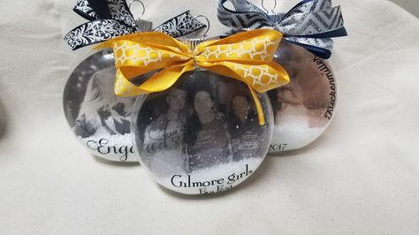 I love these so much!  They are photos printed on acetate that "float" in the center of the ornaments.     I have a long detailed post on... Cricut Cheat Sheets, Vellum Crafts, Cricut Ornaments, Svgs Free, Floating Ornaments, Clear Christmas Ornaments, Cricut Explore Air Projects, Cricut Supplies, Picture Ornaments