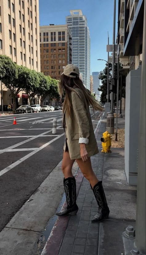 Cowboy boots, blazer outfit with biker shorts and bandeau top Cowboy Boots And Biker Shorts Outfit, Blazer With Shorts And Boots, Squared Boots Outfit, Summer Looks With Boots, Cowboy Boots Outfit Inspiration, City Cowboy Boots Outfit, Biker Shorts Boots Outfit, Outfits For Going Out To A Bar Winter, Western Inspired Street Style