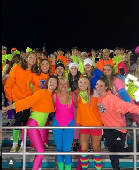 Rave Outfits For Football Game, 80s Student Section Theme, 80s Theme Football Game Outfit, Neon Night Football Theme, 80s Football Theme, Football Game Neon Theme, Super Hero Football Game Theme, Space Football Game Theme, Barbie Football Theme