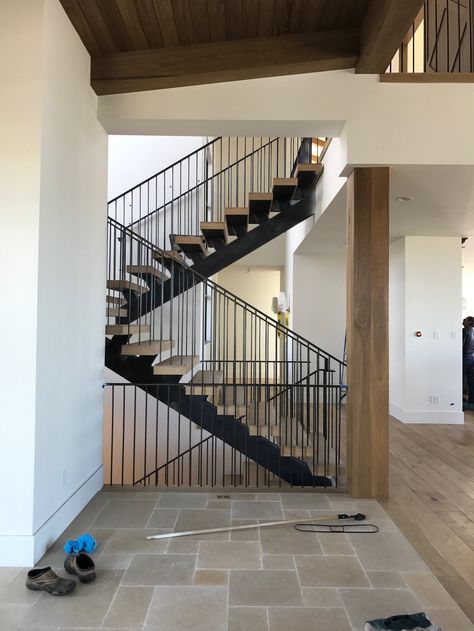 Promontory Project Progress Update Mountain House Interior, Black Stair Railing, Bold Tile, White Staircase, Black Stairs, Dark Countertops, Maximalist Design, Steel Frame Construction, Modern Beach House