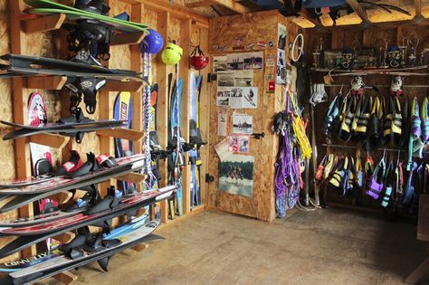 Water Ski Storage Ideas, Lake Storage Shed, Boathouse Organization Ideas, Lake Shed Organization, Water Ski Storage, Boat Dock Storage Ideas, Lake Storage Ideas, Life Jacket Storage Ideas, Life Jacket Storage