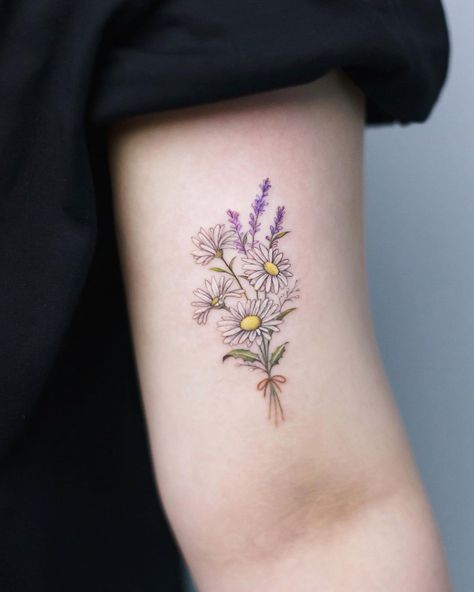 10 Best Daisy Tattoo Ideas You'll Have To See To Believe! | Outsons | Men's Fashion Tips And Style Guides Daisy Arm Band Tattoo, Fine Line Tattoo With Color, Fine Line Color Tattoo, Daisy Tattoo Ideas, Lymphoma Tattoo, Culinary Tattoos, Daisy Tattoo Designs, Pretty Flower Tattoos, Amazing 3d Tattoos