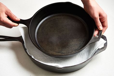 Best Way to Store Cast Iron | Kitchn Rusty Cast Iron Skillet, Cast Iron Care, Organize Kitchen, Cast Iron Cleaning, Iron Rose, Fresh Dishes, Cast Iron Skillet Recipes, Acidic Foods, Cooking For Beginners