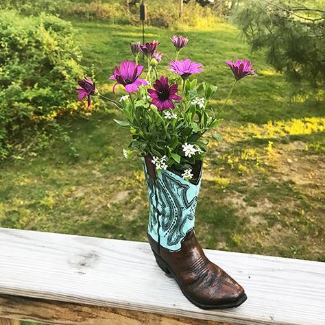 Repurposed Cowboy Boot Planter   Turn a cowboy boot vase into a real planter!       I found this polyresin cowboy boot at a hobby store. It reminds me of our rustic wedding decor. It would have fit in perfectly. Apparently it is intended to be a vase. Cowboy Boot Planter Ideas, Cowboy Boot Crafts Projects, Boot Planter Ideas, Cowboy Boot Planter, Fair Decorations, Cowboy Boot Vase, Cowboy Boot Crafts, Upcycled Planters, Old Cowboy Boots