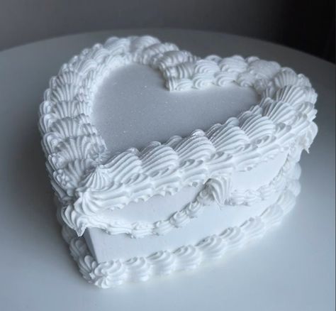 "This cake is perfect for photo shoots, coffee table art, and can even be hung on a wall! This is a smallest size I offer. Length: 7 1/2\" Width: 7 1/2\" Height: 3\" However this will vary due to the frosting. Please only clean with compressed air for dusting. If you are interested in a real version of this cake, please visit us on instagram @ maryscakeslv. We are local to Las Vegas only for real baked goods.  Products used: lightweight spackle, acrylic paint, cardboard.  Disclaimer: Because these are made to order, colors may vary slightly as they are all hand mixed. No returns or cancellations." White Heart Cake, Destination Wedding Bags, Paint Cardboard, Charm Display, Prop Cake, Coffee Table Art, Display Cake, Fake Food Props, Heart Cakes