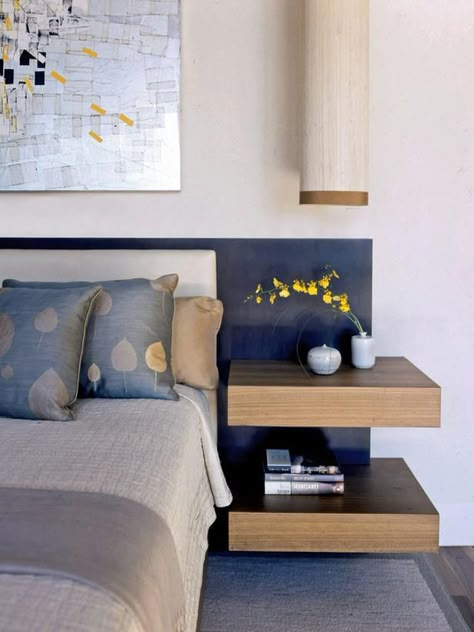 Build In Functionality - Tips for a Clutter-Free Bedroom Nightstand on HGTV . . . This cool headboard, with built in side tables actually conceals hidden drawers. Zen Bedroom Ideas, Floating Bedside Table, Floating Shelves Bedroom, Headboard With Shelves, Bedside Shelf, Floating Shelves Bathroom, Zen Bedroom, Rustic Floating Shelves, Trendy Bedroom