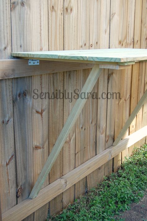 DIY Fence Table | SensiblySara.com Fence Table, Easy Backyard Diy, Diy Fence, Easy Backyard, Backyard Diy, Potting Bench, Concrete Crafts, Backyard Diy Projects, Backyard Fences