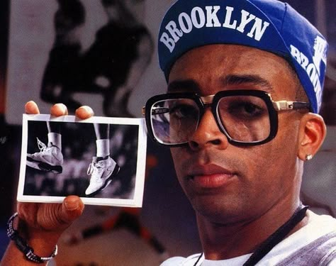 Must Watch: The Top 5 Spike Lee-Directed Movies #SpikeLee #Movies #Director #DotheRightThing #Crooklyn #Brooklyn #NYC #BlackExcellence Spike Lee Movies, Hip Hop Classics, Desain Editorial, Spike Lee, Black Hollywood, Cycling Cap, Hip Hop Culture, Vintage Eyewear, Film Director