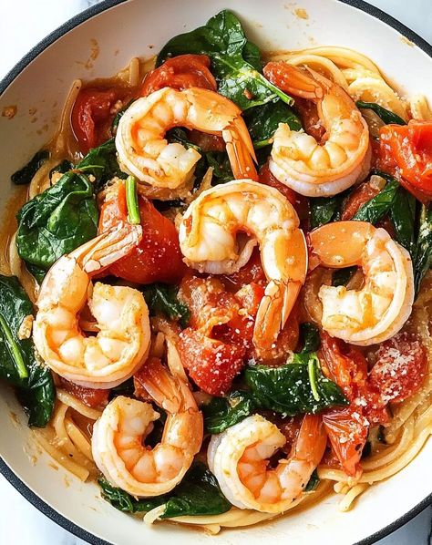 This post may contain affiliate links learn more     This Tomato Spinach Shrimp Pasta is a quick, flavorful, and healthy dish that’s perfect for busy weeknights or a casual dinner ... Read more Shrimp Spinach Pasta Recipes Easy, Tomato Spinach Shrimp Pasta, Shrimp Spinach Pasta Recipes, Spinach Shrimp Pasta, Shrimp And Spinach Recipes, Shrimp Spinach Pasta, Shrimp And Spinach, Spinach Tomato Pasta, Shrimp Spinach