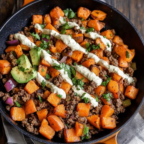 Quick and delicious Ground Beef and Sweet Potatoes Skillet, perfect for a healthy dinner. Ready in 30 minutes! Sweet Potato Recipes Ground Beef, Hamburger Sweet Potato Skillet, Ground Beef With Sweet Potatoes, Sweet Potato Ground Beef Bowl, Steak And Sweet Potato Dinners, Ground Beef And Sweet Potato Recipes, Mediterranean Ground Beef Recipes, Ground Beef Sweet Potato Recipes, Sweet Potato And Ground Beef