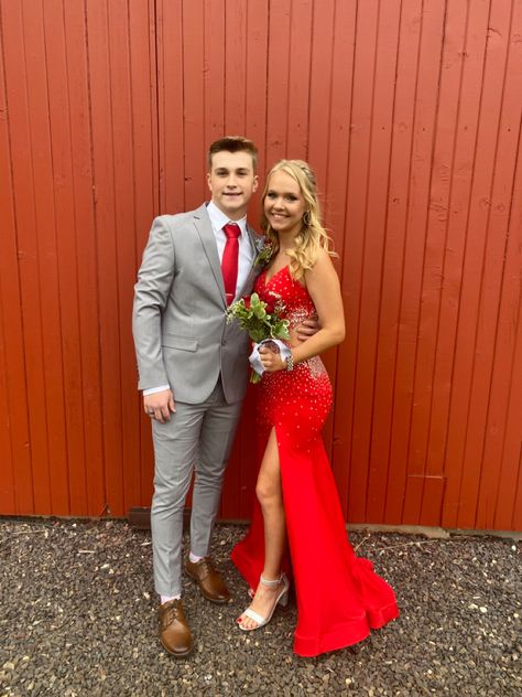 Red Prom Dress Shoes Ideas, Red Prom Dress Grey Suit, Red And Gray Prom Couple, Red Dress Grey Suit Prom Couple, Red Prom Dress And Date, Silver And Red Prom Couple, Red Prom Dress With Date, Grey Suit Prom, All Red Prom Couple