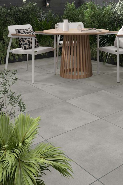 Designed to withstand the elements, Oakworth offers the perfect combination of strength and style. Providing a slip-resistant surface that is easy to clean and maintain, choose from classic Ivory or contemporary Grey. Outdoor Patio Tile Ideas, Patio Tile Ideas, Modern Tile Designs, Tiles Outdoor, Outdoor Porcelain Tile, Outdoor Pavers, Gray Porcelain Tile, Patio Tiles, Flooring Materials