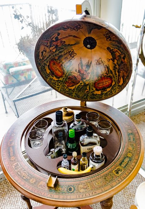 Globe Bar Cart, Mid Century Modern Glam, Modern Glam Decor, Eclectic Glam, Globe Bar, Chicago Condos, Green Chairs, Old Globe, Glam Design