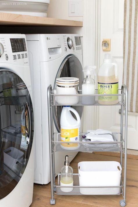 This slim rolling storage cart that goes between the washer and dryer for smart laundry room storage is everything!! #laundryroom #laundryrooms #laundryroomstorage Laundry Room Organization Between Washer And Dryer, Utility Cart Laundry Room, Slim Laundry Storage, Shelf For Between Washer And Dryer, Laundry Room Space Between Washer And Dryer, Laundry Cart Organization, In Between Washer And Dryer Storage, Small Laundry Storage Ideas, Shelf Between Washer And Dryer