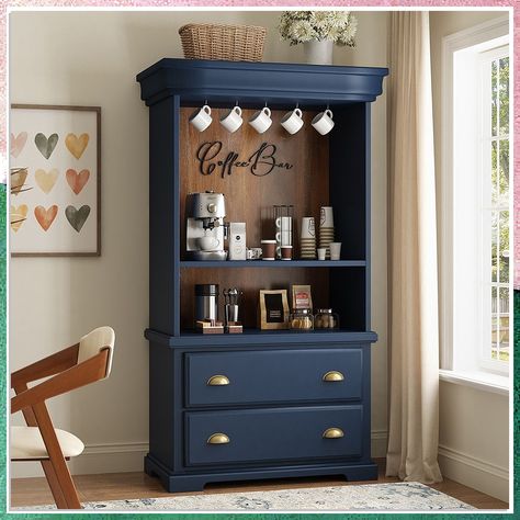 Looking to create a cozy coffee nook in your small space? Check out these creative coffee bar ideas for small spaces that will transform your home into a stylish and functional caffeine corner. From compact shelves to wall-mounted racks, these clever solutions will help you enjoy your favorite brew without taking up too much space. Get inspired and revamp your small space with these coffee bar ideas today! Coffee Station Armoire, Dark Blue Coffee Bar, Bookshelf Into Coffee Bar, Bookshelf Coffee Station, Wooden Coffee Bar Ideas, Coffee Bar In Cupboard, Coffee Bar Ideas For Men, Wardrobe Coffee Station, Tv Stand Coffee Bar