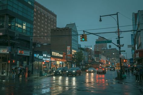 Rainy night street scene in Flushing, Queens, New York Flushing Queens New York, Rainy Night Street, Flushing New York, Trish Una, Flushing Queens, Queens Nyc, Night Street, Queens New York, New York Aesthetic