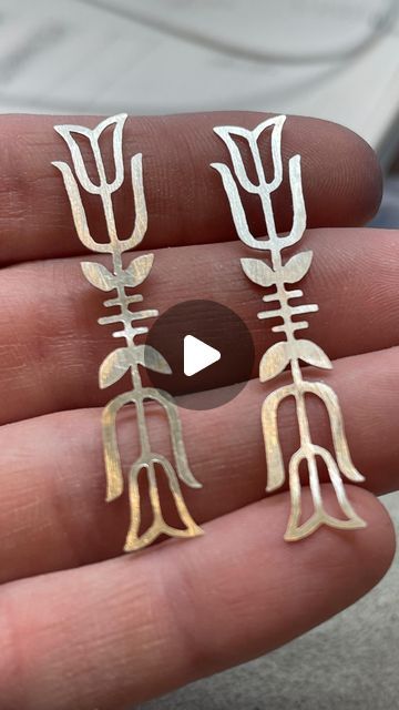 Shannon Bundschuh on Instagram: "Mach speed 💨 of the FIKA earring saw process for those who had inquiries. I thought this might be helpful. Lemme know if y’all have more questions! I didn’t get the actual sawing part 🤦🏻‍♀️ BUT… you get to see the rest of how I made duplicates without the extra work of sawing a design out TWICE. 

I’m having a wonderful time relaxing with my kids and hubs. Much deserved. It is good to step back for a moment and look forward to time in the studio. Feeling suuuuuuper grateful for this life! 💫

And who is ready for another season of White Lotus? 🪷 

meeeeeee 🙌🏼

#carryatorch #crushworthyjewelry #process #spedup #machspeed #jewelrydesigner #scandicollection #scandinavianinspired #tiptoethroughthetulips #tulips #sawing #fika #earrings #jewelryartist #meta Extra Work, White Lotus, Scandinavian Inspired, Step Back, Jewelry Tools, In The Studio, Artistic Jewelry, Wonderful Time, The Studio