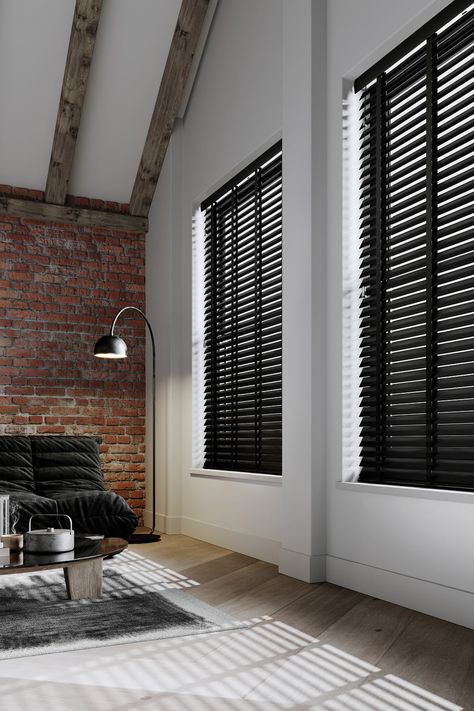 Black wooden blinds with tapes in a modern loft apartment Black Wooden Blinds Living Room, Colored Blinds For Windows, Black Horizontal Blinds, Living Room With Blinds Only, Black Bamboo Blinds, Black Blinds Bedroom, Blinds For Black Windows, Modern Blinds For Windows Living Room, Black Wooden Blinds