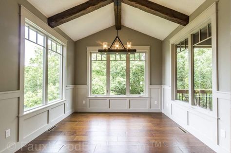 The vaulted ceiling of this sunroom is an excellent place for faux beams. Faux beams mean that you won't have to install extra supports, as solid wooden beams are incredibly heavy. Den Addition, Fake Wood Beams, Vaulted Ceiling Beams, Wood Ceiling Beams, Faux Wood Ceiling, Senior Housing, 20ft Container, Faux Wood Beams, Faux Beams