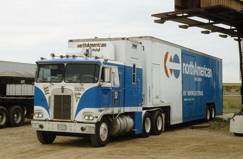 This sweet Kenworth leased to North American Van Lines was kicking back and relaxing when I snapped it at the Iowa 80 Truck Stop in Walcott, Iowa on July 13, 1990. Moving Trucks, Big Ford Trucks, Moving Van, Custom Lifted Trucks, Truck Stop, Tractor Trailer Truck, American Trucks, Van Lines, Road Train