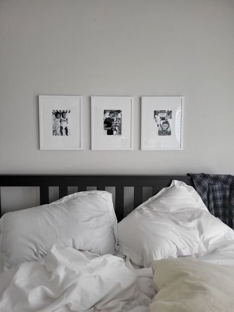 Black white pictures over the bed 3 Frames Above Bed, Picture Frames Above Bed, Over The Bed Decor Ideas, Pictures Over Bed, Frames Above Bed, Grey Room Ideas Bedroom, Pictures Above Bed, Over The Bed Decor, Grey Headboard