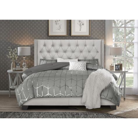 Make your bedroom a retreat with the timeless design of the Brady Upholstered Tufted Wingback Panel Bed. The wingback headboard with deep button-tufting and silver nailhead trim, along with the rugged poly fabric upholstery, exude elegance and luxury. Small Luxury Apartment Bedroom, Taupe Upholstered Bed Bedroom Ideas, Silver Headboard Bedroom, Modern Bedroom Elegant, Wayfair Bedroom Ideas, King Size Bed In Small Bedroom Ideas, Bedroom Setup Ideas, Glam Headboard, Bedroom Sets Furniture