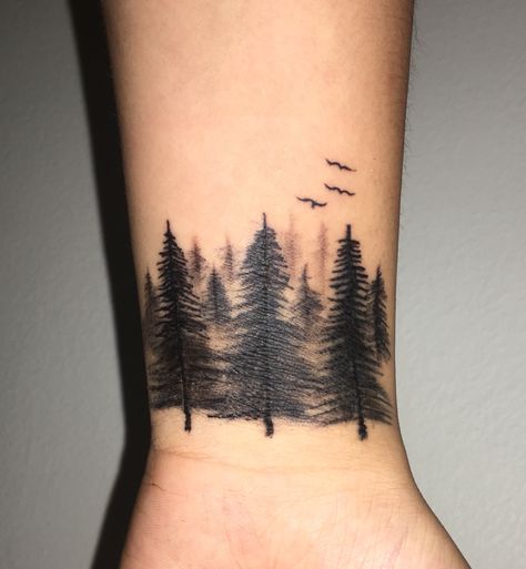 Cute detailed small Forrest tattoo on inner wrist #tattoos #tattoosforwomen #tattooideas #tattoodesigns #wristtattoo Trees Around Wrist Tattoo, Small Forrest Tattoo Design, Inner Wrist Tattoos Cover Up, Wrist Tree Tattoos For Women, Wrist Tattoos Men Cover Up, Cover Up Tattoos For Men Wrist, Tree Wrist Tattoos For Women, Forest Wrist Tattoo, Cover Up Tattoos For Women Wrist