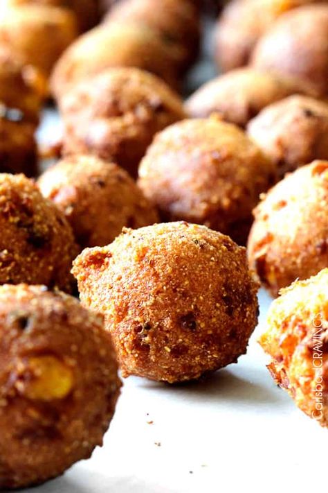 Hush Puppies are irresistible and SO easy to make at home! Hush Puppies with a crispy, golden outside and soft, cornbread inside infused with bacon, pepper Jack cheese dunked in the most tantalizing sweet and tangy Sweet Chili Dijon Sauce! Are you drooling yet?  Hush Puppies are one of the most crave worthy morsels ever - AND this hush puppies recipe is one of the world's easiest appetizers to make!  You can make hush puppy batter ahead of time and refrigerate for easy assembly, or make and ... Cookout Hush Puppies Recipe, Best Homemade Hushpuppies, Soft Cornbread, Jalapeno Hush Puppies, Hush Puppies With Corn, Easy Hush Puppy Recipe, Easiest Appetizers, Southern Fried Catfish, Hush Puppy